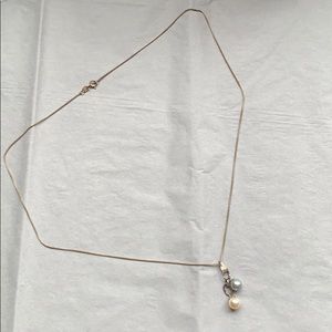 Night and day pearl necklace